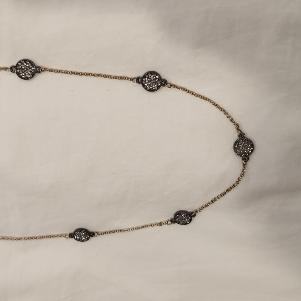Long gold necklace
